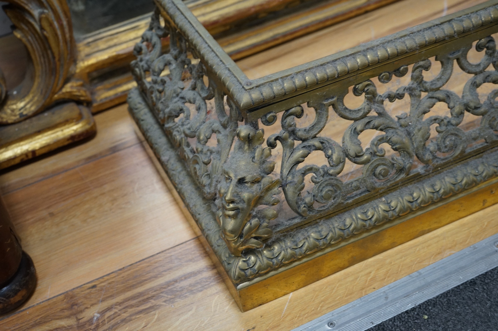 A 19th century cast bronze fender, signed Hollenbach, Wien, 98cm x 27cm deep. Condition - good